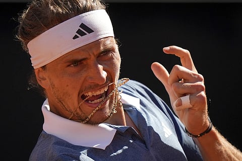 Germany's Alexander Zverev returns the ball to Chile's Alejandro Tabilo during a men's tennis semifinal match at the Italian Open tennis tournament in Rome, Friday, May 17, 2024.