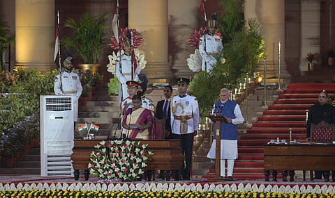 President Droupadi Murmu administers the oath of office to Prime Minister-designate Narendra Modi at the Rashtrapati Bhawan in New Delhi on Sunday.