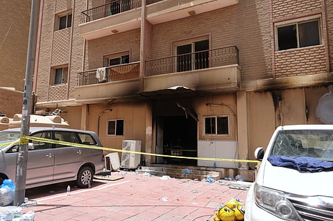 A picture shows a building that was engulfed by fire in Kuwait City on June 12, 2024.