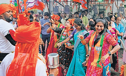 With cries of ‘Bharat Mata Ki Jai!’ and ‘Modi ki Jai!, ‘BJP cadre celebrate the party’s victory in Malleswaram on Tuesday. Similar celebrations were also witnessed in counting centres of Bangalore South, Central and North Lok Sabha constituencies