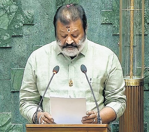 Thrissur MP Suresh Gopi takes oath during the first session of the 18th Lok Sabha in New Delhi on Monday