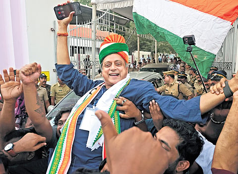 Congress workers carry Shashi Tharoor, the UDF candidate from Thiruvananthapuram Lok Sabha constituency while celebrating his victory