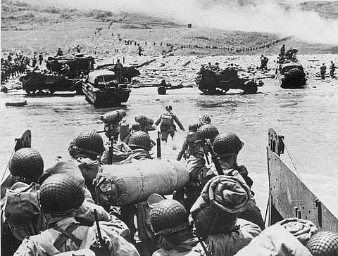 American soldiers and supplies arrive on the shore of the French coast of German-occupied Normandy during the Allied D-Day invasion on June 6, 1944 in World War II.