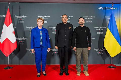 (From L) Swiss Federal President Viola Amherd, India's Foreign Ministry official Pavan Kapoor and Ukraine's President Volodymyr Zelensky pose prior to the opening of the Summit on peace in Ukraine, at the luxury Burgenstock resort, near Lucerne, on June 15, 2024.