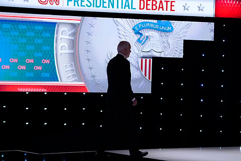 President Joe Biden walks from the stage during a break in a presidential debate with Republican presidential candidate former President Donald Trump Thursday, June 27, 2024, in Atlanta.