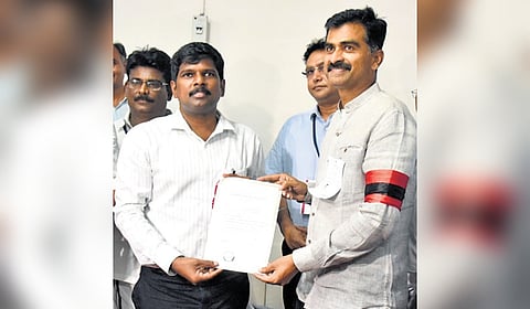 Durai Vaiko receiving the winning certificate from returning officer
M Pradeep Kumar