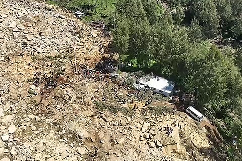 This frame grab from AFPTV video footage taken on May 27, 2024 shows the site of a landslide in Yambali village in the region of Maip Mulitaka, in Enga Province, Papua New Guinea.