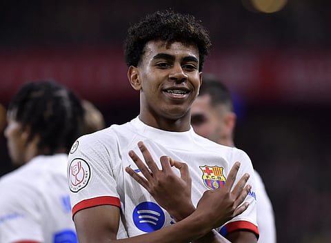 Barcelona's Lamine Yamal celebrates scoring his side's second goal during the Copa del Rey quarterfinals soccer match against Athletic Bilbao Spain, January, 24, 2024.
