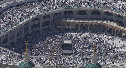 Muslim pilgrims circumambulate the Kaaba, the cubic building at the Grand Mosque, during the annual Hajj pilgrimage in Mecca, Saudi Arabia, Monday, June 17, 2024.