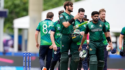 Pakistan's Shaheen Shah Afridi, third left, gestures as he leaves the field with captain Babar Azam after Pakistan won the ICC Men's T20 World Cup cricket match against Ireland at the Central Broward Regional Park Stadium, Lauderhill, Fla., Sunday, June 16, 2024.