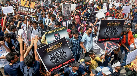 Students stage a protest demanding re-examination of NEET-UG 2024 results.