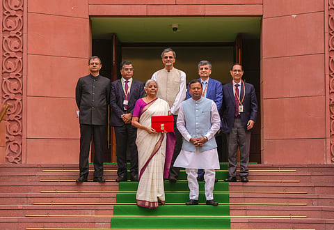 Union Finance Minister Nirmala Sitharaman with a red pouch carrying the Budget documents at the Parliament to present the Union Budget 2024-25, in New Delhi, Tuesday, July 23, 2024.
