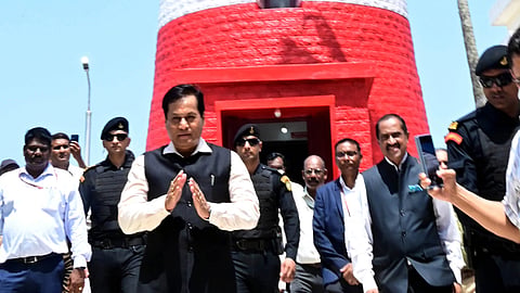Union Minister of Ports, Shipping and Waterways Sarbananda Sonowal returns after visiting the lighthouse on the Kovalam Beach in Thiruvananthapuram on Thursday.