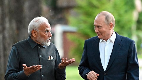 In this photo from July 8, 2024, Prime Minister Narendra Modi, left, and Russian President Vladimir Putin walk during an informal meeting at Novo-Ogaryovo residence, outside Moscow in Russia.