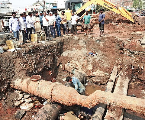 Municipal workers were seen repairing water pipelines in Guntur on Tuesday