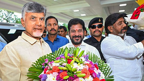 Telangana Chief Minister Revanth Reddy welcomes Andhra Pradesh Chief Minister N Chandrababu Naidu upon his arrival at Praja Bhavan, in Hyderabad.