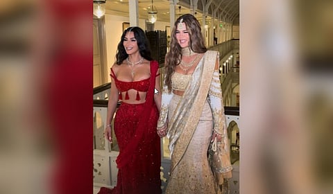 American media personalities and sisters Kim and Khloe Kardashian arrive to attend Anant Ambani and Radhika Merchant's wedding, in Mumbai.