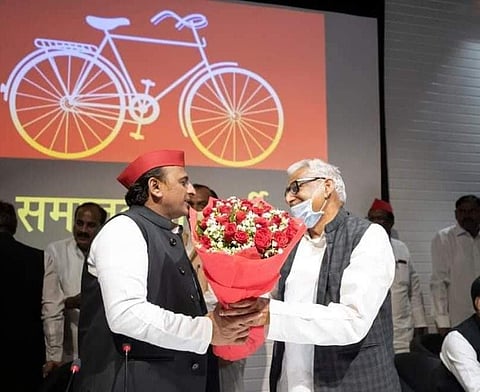 Newly appointed Leader of Opposition in UP Assembly Mata Prasad Pandey with SP chief Akhilesh Yadav.
