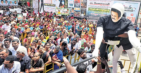 AIADMK cadre led by former minister Sellur K Raju staged a protest against the power tariff hike in Madurai on Tuesday.
