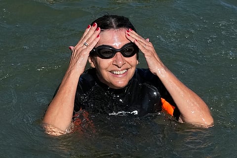Paris Mayor Anne Hidalgo swims in the Seine river on July 17, nine days before the opening ceremony of the 2024 Olympics fulfilling a promise she made in January,