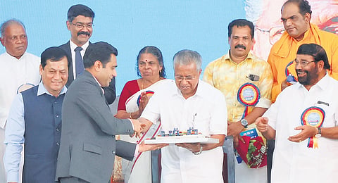 Adani Ports and SEZ Limited managing director Karan Adani presenting a model of the Vizhinjam International Seaport to Chief Minister Pinarayi Vijayan at the function to welcome the first mothership MV San Fernando that docked at the port. Union Minister of Ports, Shipping and Waterways Sarbananda Sonowal and state Ports Minister V N Vasavan are also seen