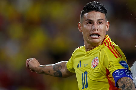 Colombia's James Rodriguez jumps for a header during a Copa America semifinal soccer match against Uruguay in Charlotte, N.C., Wednesday, July 10, 2024.