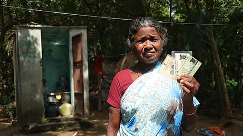 R Marimuthu outside the toilet in which she is living now.