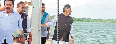 Deputy Chief Minister DK Shivakumar inspects Krishna Raja Sagar dam in Mandya on Monday.