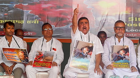 Leader of Opposition in West Bengal Assembly and BJP leader Suvendu Adhikari (2R) with party leaders during a protest against the alleged violence in the state following general elections, near Raj Bhavan, in Kolkata, Sunday, July 14, 2024.