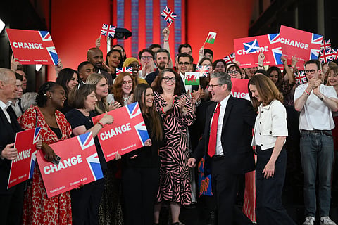 Britain's Labour Party leader Keir Starmer and his wife Victoria celebrate during a victory rally at the Tate Modern in London early on July 5, 2024.