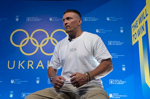 World Heavyweight boxing champion Oleksandr Usyk speaks during a visit to the Ukrainian House.