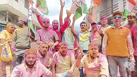 Congress party workers celebrating the party's big win in Uttarakhand assembly byelections.