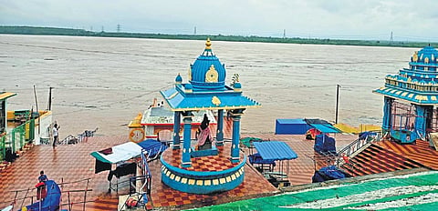 Water overflows on to the bathing ghats near the Sri Sita
Ramachandraswamy temple in Bhadrachalam on Saturday