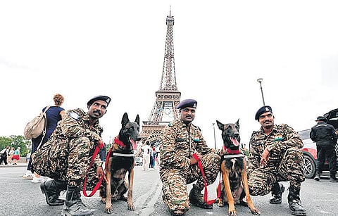 CRPF’s canines Vast and Denby, along with three handlers, in Paris on Wednesday