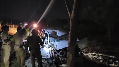 Police at the site of the car crash.