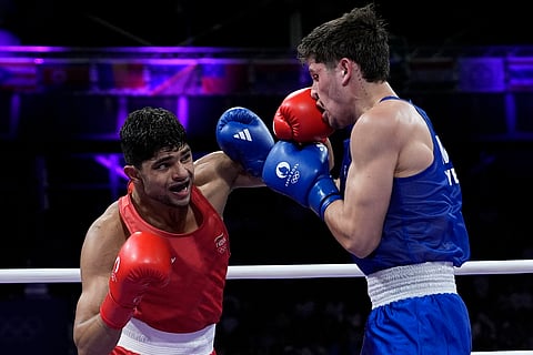 India's Nishant Dev, left, fights Mexico's Marco Verde in their men's 71kg quarterfinal boxing match at the 2024 Summer Olympics, Saturday, Aug. 3, 2024, in Paris, France.