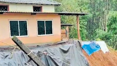 A landslip close to a house
at Gudde Thota in Koppa talukÂ