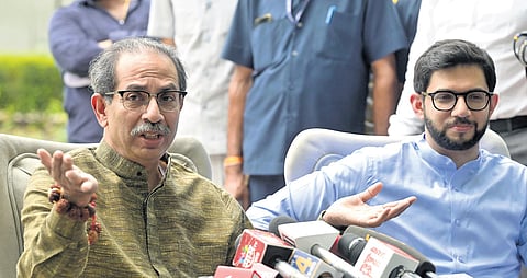 Shiv Sena (UBT) chief Uddhav Thackeray and son Aditya Thackeray address a
press conference in New Delhi