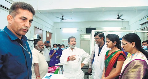 Health Minister Damodar Rajanarasimha speaks to the staff of the Government
Medical College