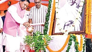 Chief Minister Mohan Charan Majhi paying tributes to Mahatma Gandhi on the occasion