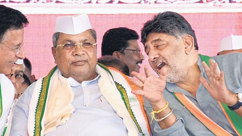 AICC General Secretary Randeep Singh Surjewala, Chief Minister Siddaramaiah and DyCM DK Shivakumar at Janandolana rally in Mysuru