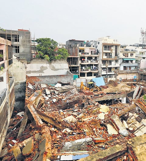 Dilapidated building collapsed in Delhi's Model Town during repairs.