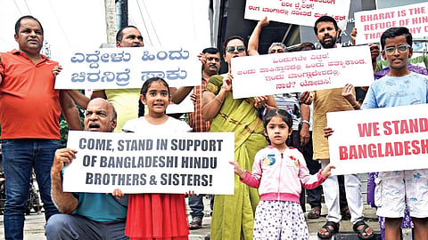 Bengalureans extend their support to Bangladeshi Hindus during a protest in Bengaluru on Saturday.