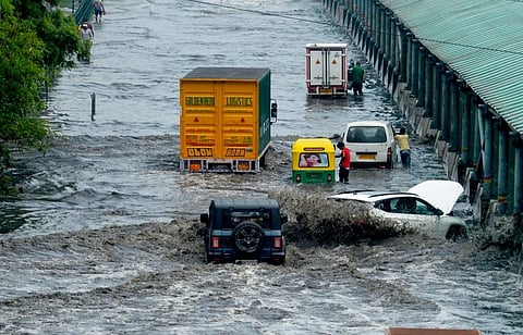 Inadequate drains, encroached natural channels and disappearing wetlands cause widespread waterlogging, while poorly repaired roads worsen the national capital’s flooding woes.