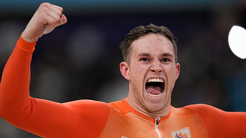 Harrie Lavreysen of Netherlands celebrates winning the gold medal of the men's keirin event, at the Summer Olympics.