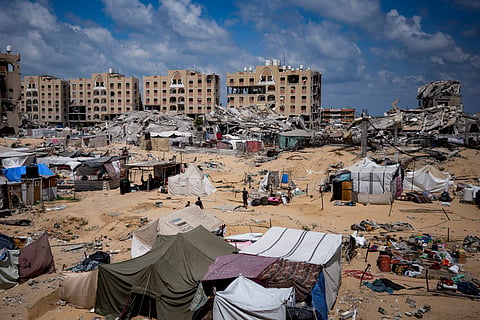 Palestinians displaced by the Israeli air and ground offensive on the Gaza Strip flee from Hamad City, following an evacuation order by the Israeli army to leave parts of the southern area of Khan Younis, Sunday, Aug. 11, 2024.