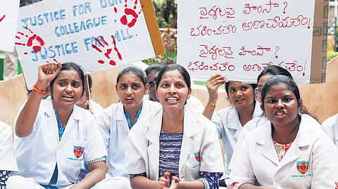APJUDA members stage a protest at KGH in Vizag