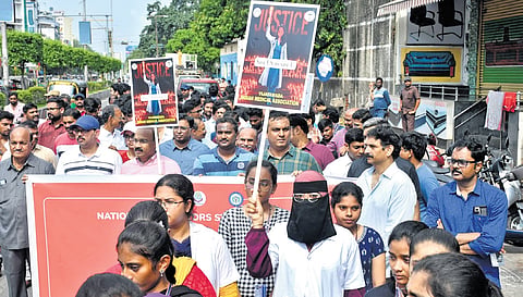 IMA members and doctors took out a rally, demanding justice for Kolkata’s PG medical student who was raped and murdered, in Vijayawada