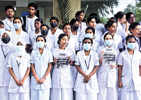 Members of Kerala Government Nurses Association protest on Saturday before the Ernakulam General Hospital as part of the nationwide strike called by health workers against the rape and murder of a trainee doctor in Kolkata