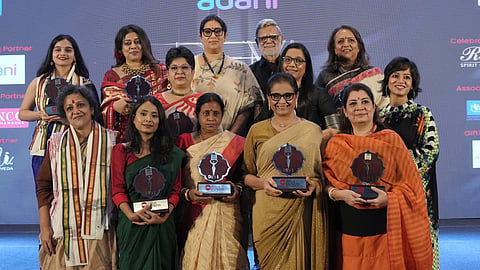 Devis celebrate their awards with TNIE Editorial Director Prabhu Chawla and chief guest Smriti Irani.
